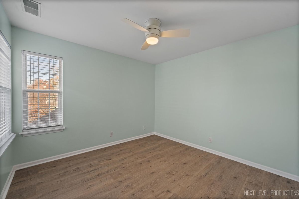 1441 Walnut Hill Avenue St. Charles, IL 60174 - Photo 17 of 22 an empty room with a window