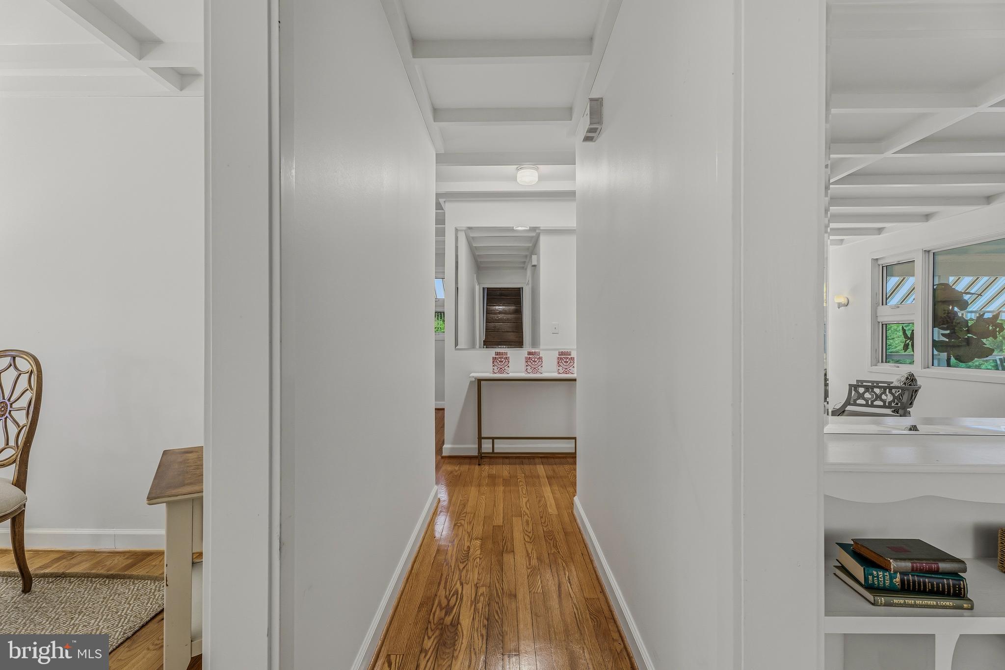 2425 Albert Rill Road Hampstead, MD 21074 - Photo 23 of 44 a view of a hallway with wooden floor and a bathroom