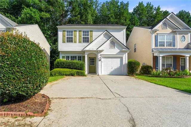 front view of a house and a yard