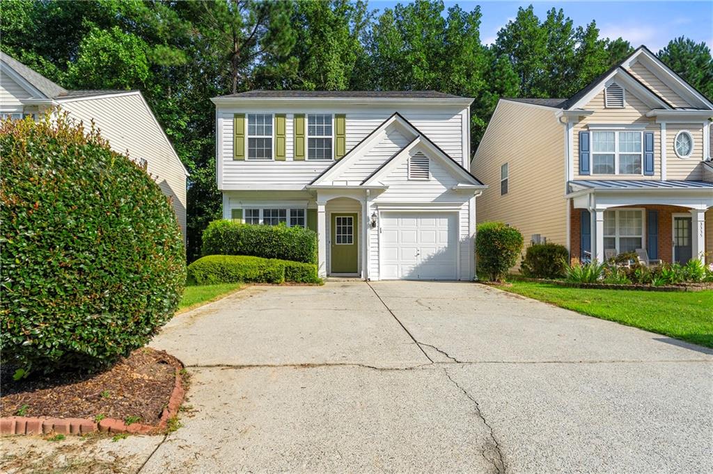 front view of a house and a yard