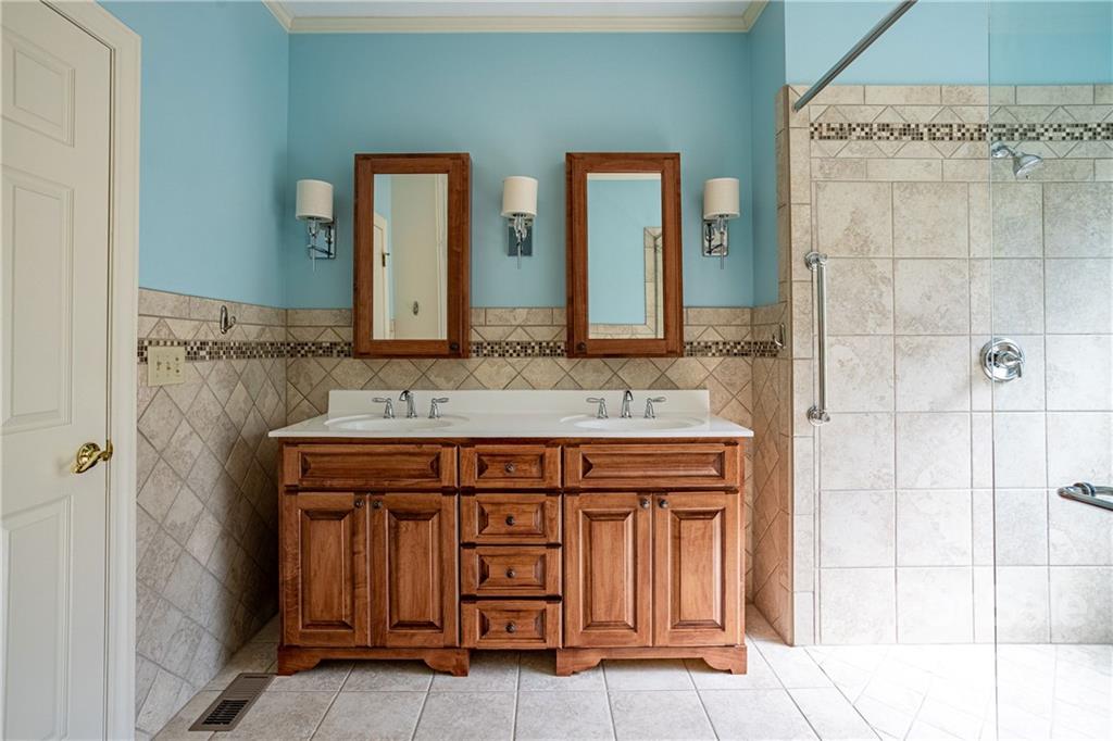 200 Hunt Trace, Unit B Camden, SC 29020 - Photo 14 of 40 a bathroom with a sink and a mirror
