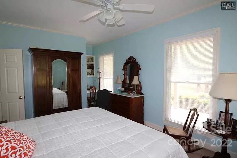 200 Hunt Trace, Unit B Camden, SC 29020 - Photo 19 of 40 a bedroom with a bed and a window