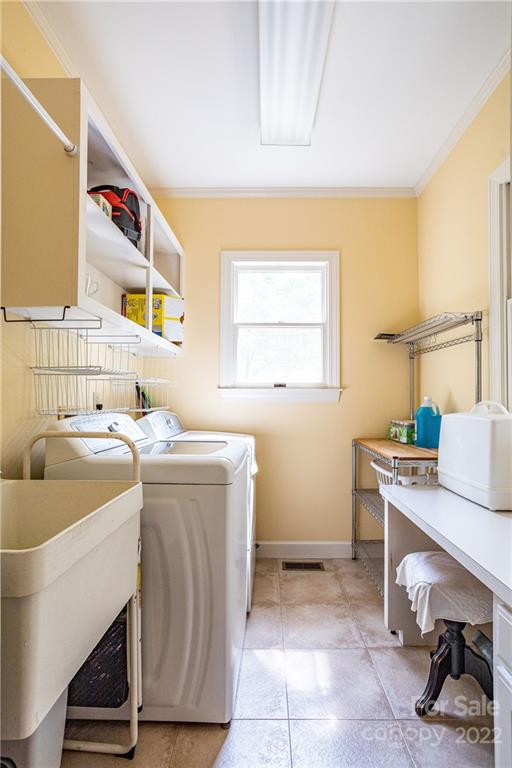 200 Hunt Trace, Unit B Camden, SC 29020 - Photo 23 of 40 a room with a sink cabinets and utility room