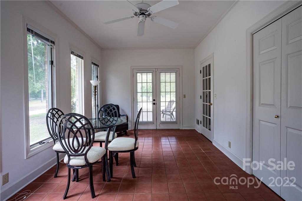 200 Hunt Trace, Unit B Camden, SC 29020 - Photo 24 of 40 a view of a dining room with furniture window and wooden floor