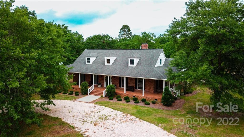 200 Hunt Trace, Unit B Camden, SC 29020 - Photo 38 of 40 a front view of a house with garden