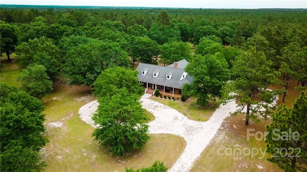 200 Hunt Trace, Unit B Camden, SC 29020 - Photo 39 of 40 a aerial view of a house with swimming pool and garden