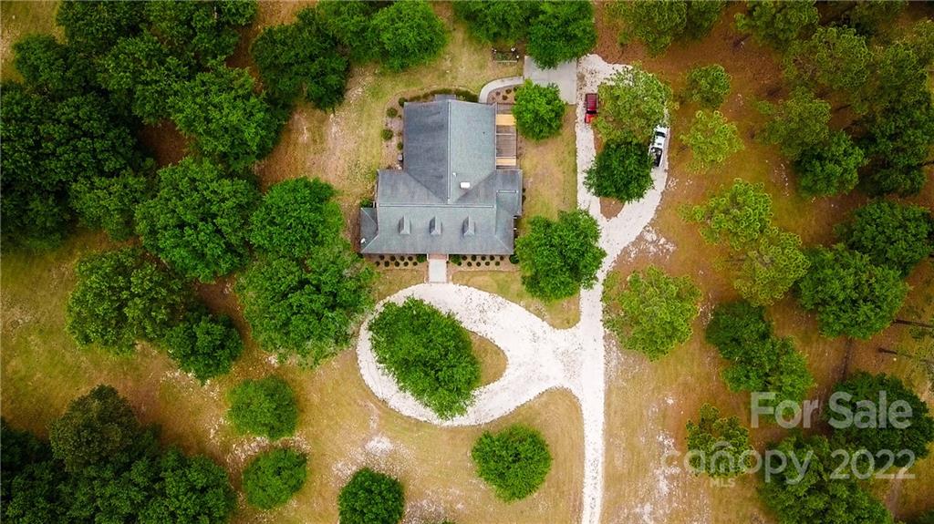 200 Hunt Trace, Unit B Camden, SC 29020 - Photo 40 of 40 an aerial view of residential house with outdoor space and trees all around