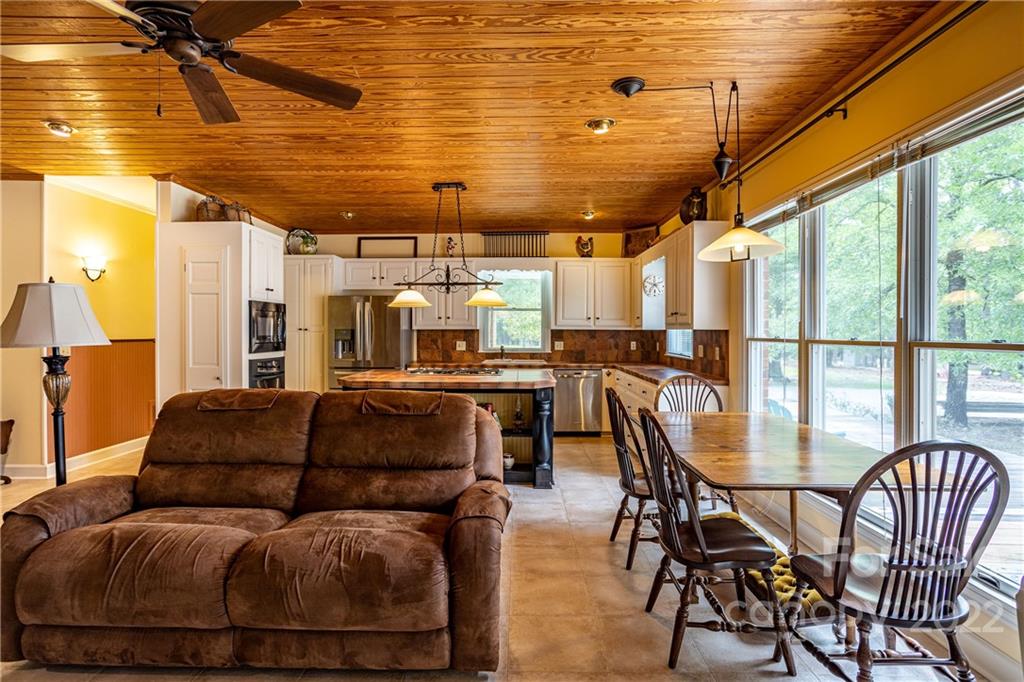 200 Hunt Trace, Unit B Camden, SC 29020 - Photo 9 of 40 a living room with furniture and a large window