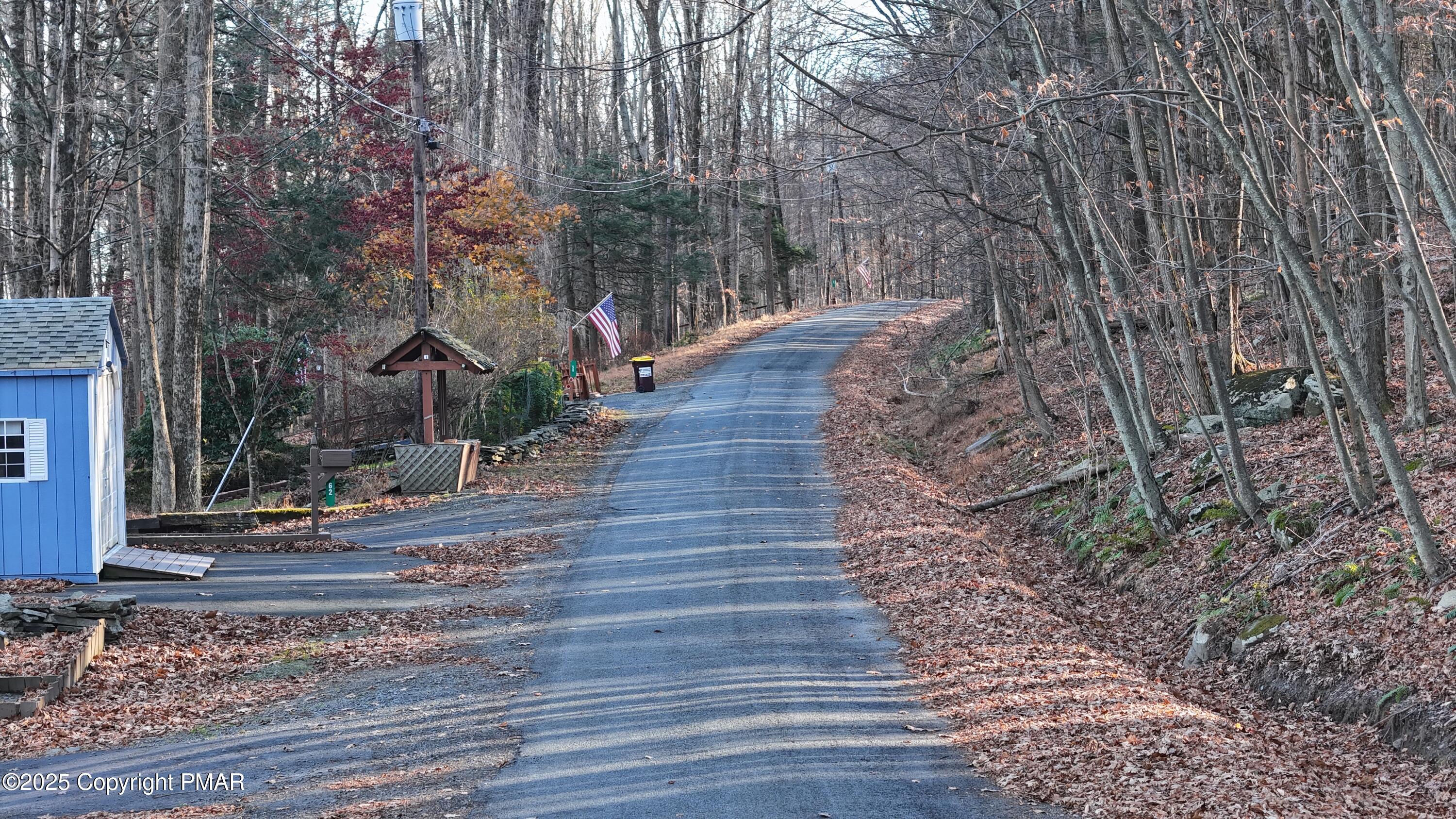 131 L Sheridan Road Hawley, PA 18428 - Photo 11 of 13 a pathway of a house with a yard