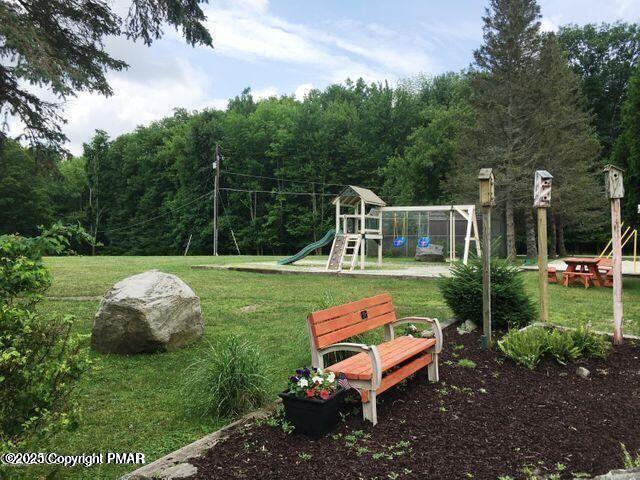 131 L Sheridan Road Hawley, PA 18428 - Photo 9 of 13 a garden view with a seating space