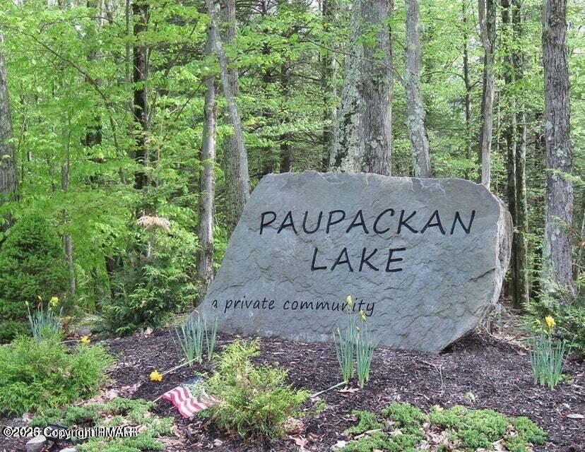 131 L Sheridan Road Hawley, PA 18428 - Photo 10 of 13 a view of a sign in a garden