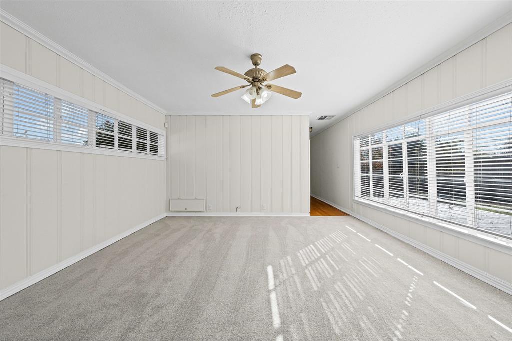 1919 North 7th Street Temple, TX 76501 - Photo 21 of 36 a view of a room with a window and a ceiling fan