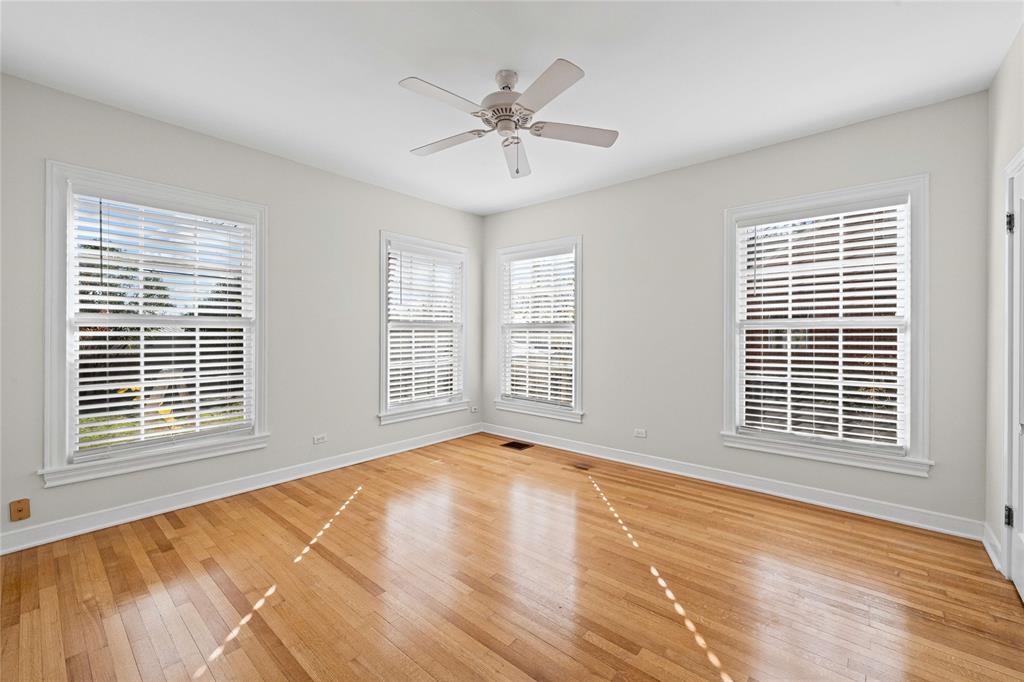1919 North 7th Street Temple, TX 76501 - Photo 31 of 36 a view of an empty room with a window and wooden floor