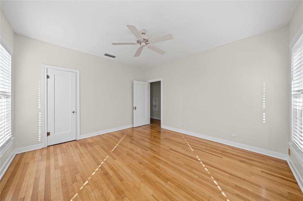 1919 North 7th Street Temple, TX 76501 - Photo 32 of 36 a view of an empty room with wooden floor and a window