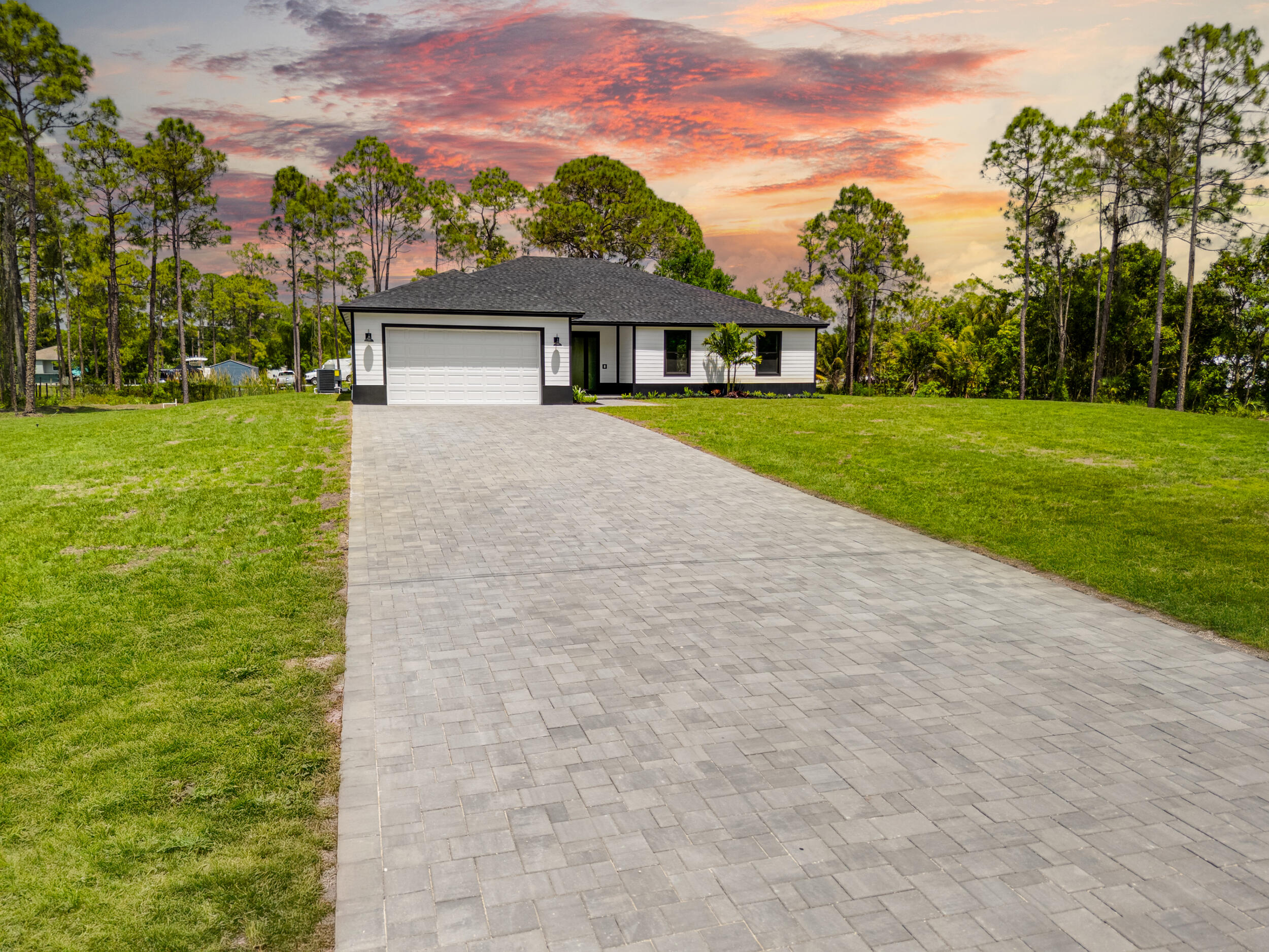 17563 88th Road North Loxahatchee, FL 33470 - Photo 8 of 63 Front Elevation with Driveway