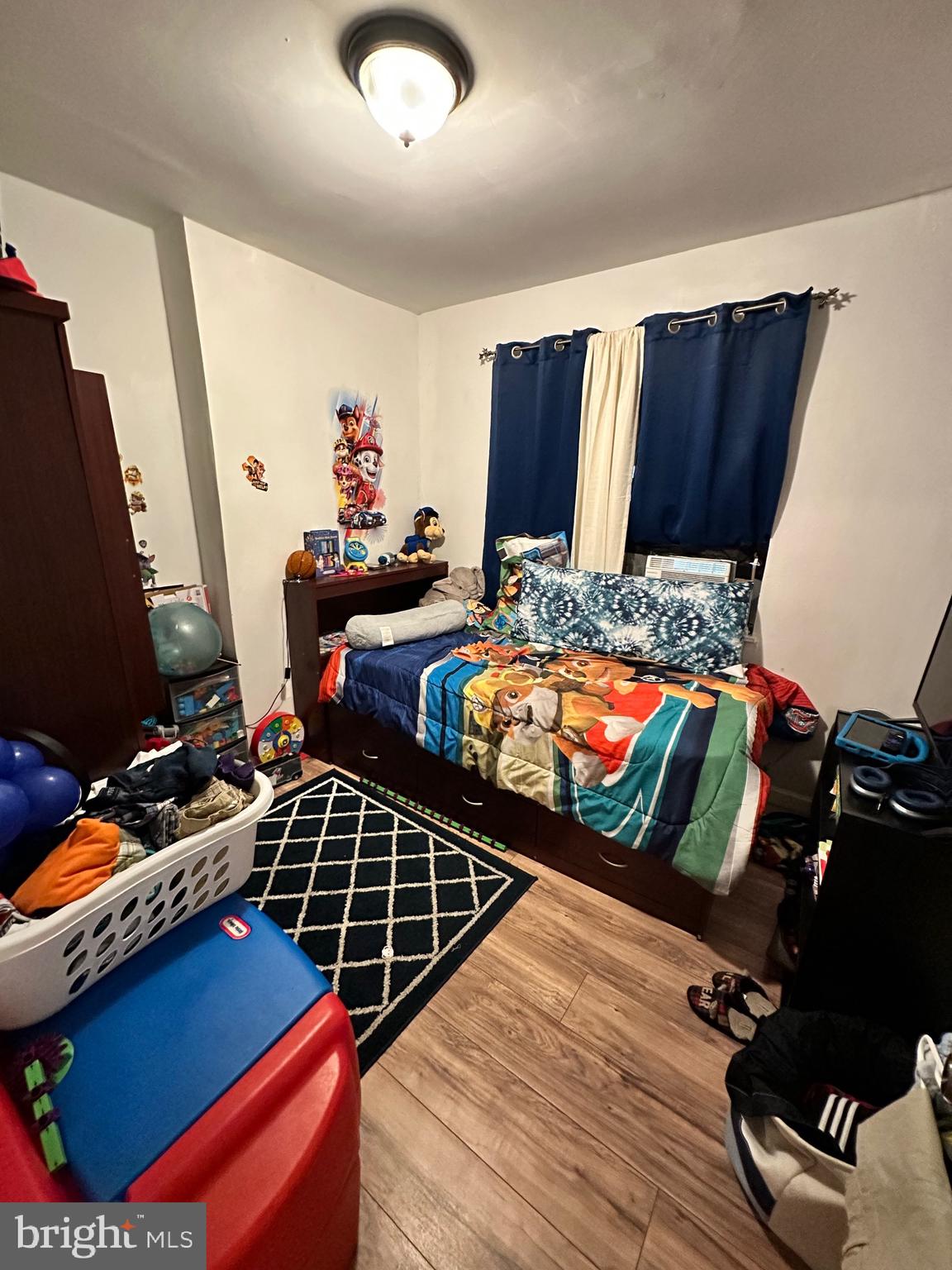 6148 Reedland Street Philadelphia, PA 19142 - Photo 11 of 20 a bedroom with double bunk beds and a window