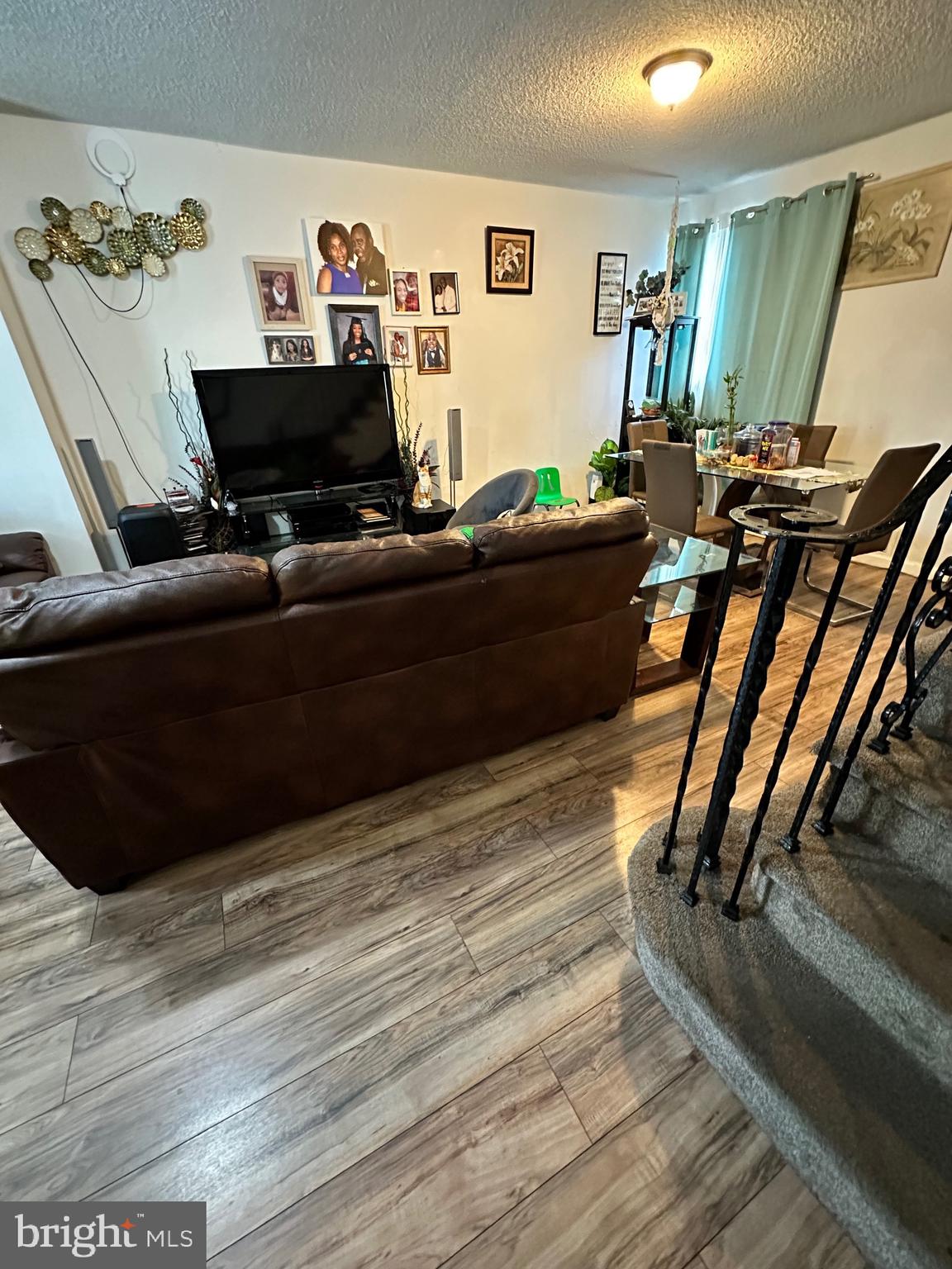 6148 Reedland Street Philadelphia, PA 19142 - Photo 3 of 20 a room with furniture and wooden floor