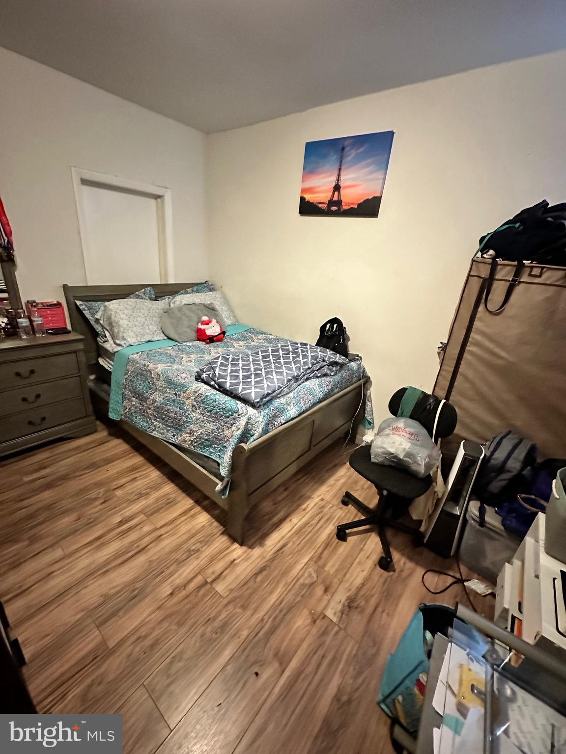 6148 Reedland Street Philadelphia, PA 19142 - Photo 10 of 20 a bedroom with a bed and wooden floor