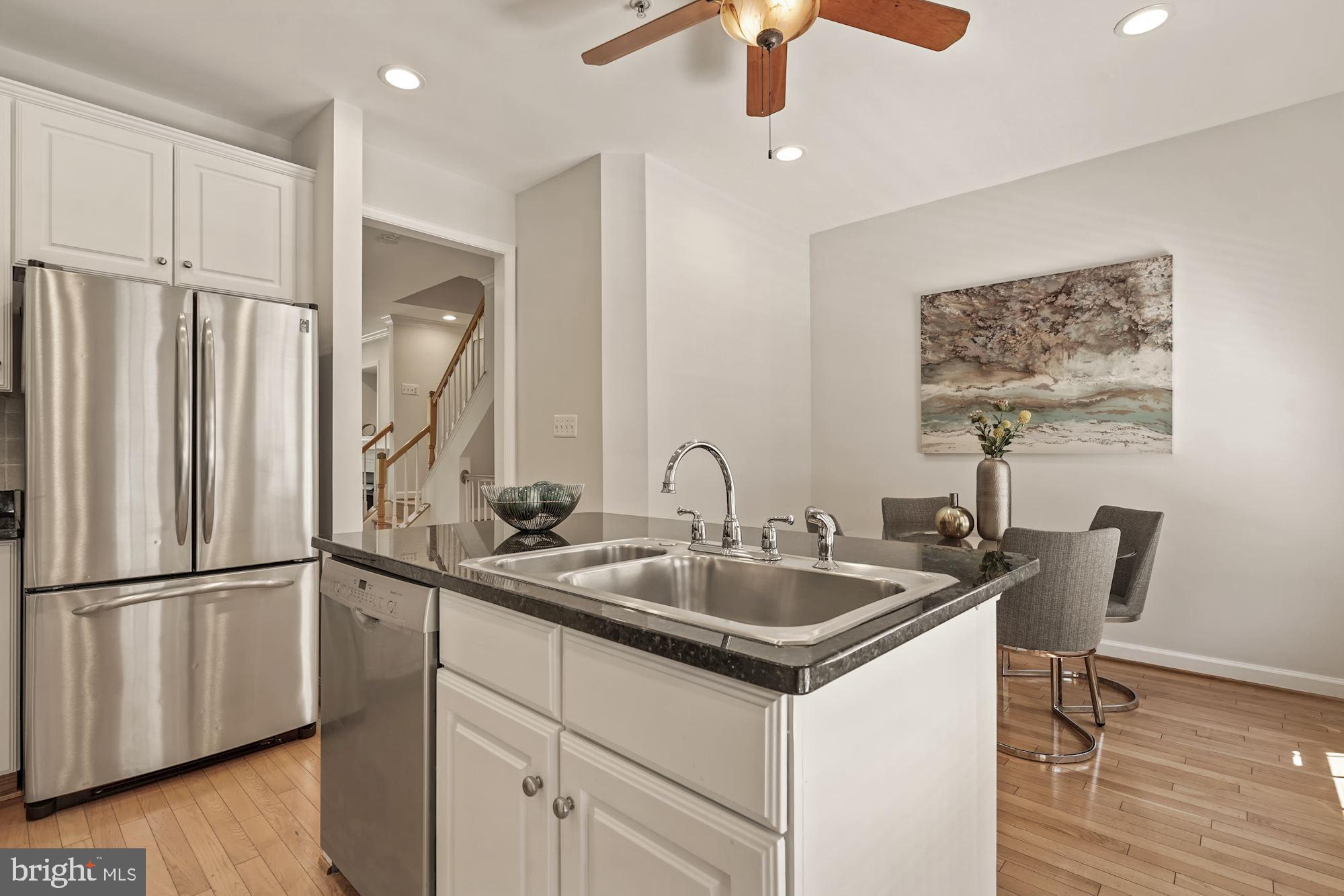 724 Capitol Square Place Southwest Washington, DC 20024 - Photo 17 of 40 Stainless steel appliances & a kitchen island