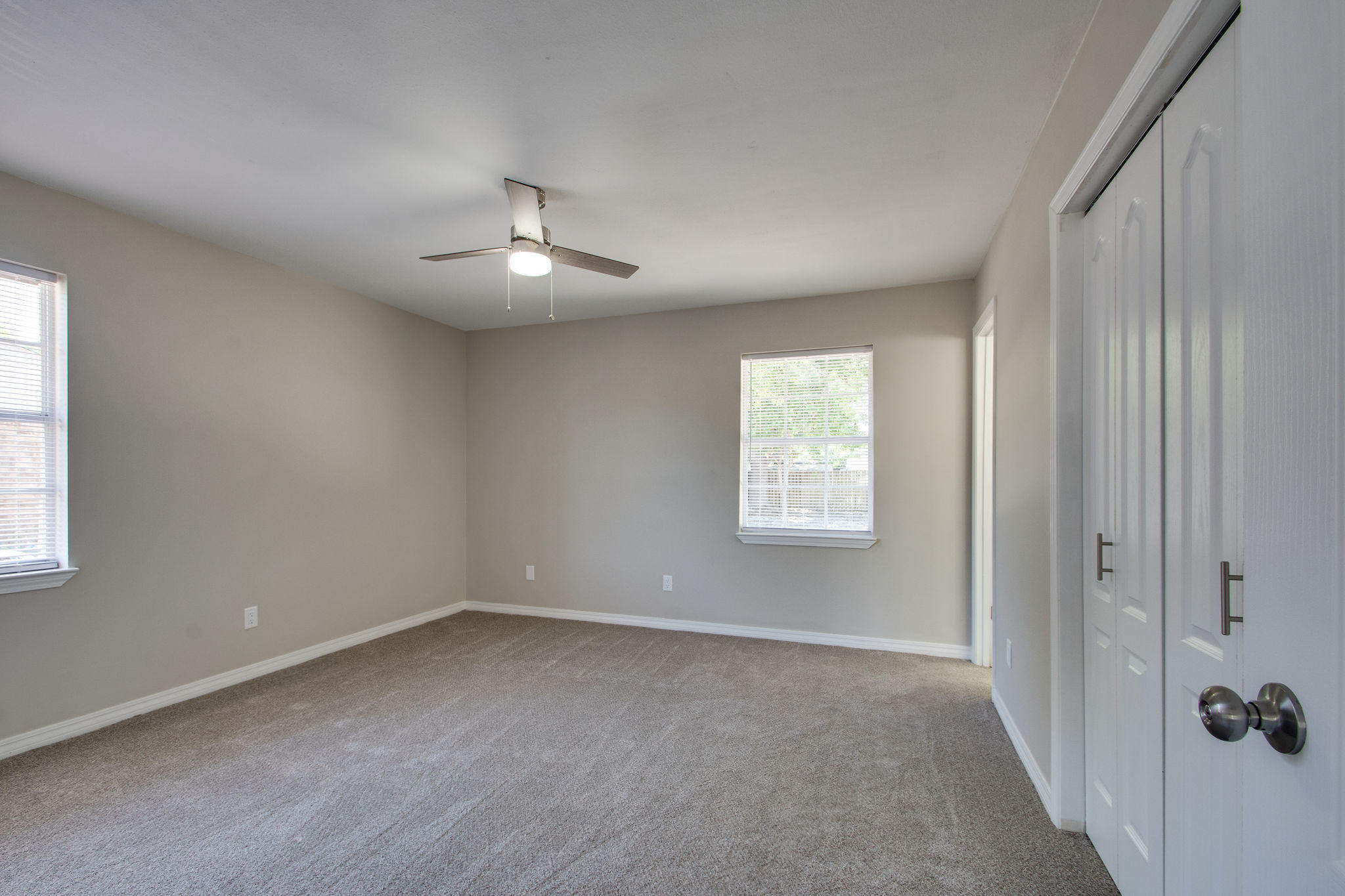 409 Main Street Destin, FL 32541 - Photo 13 of 19 wooden floor in an empty room with a window