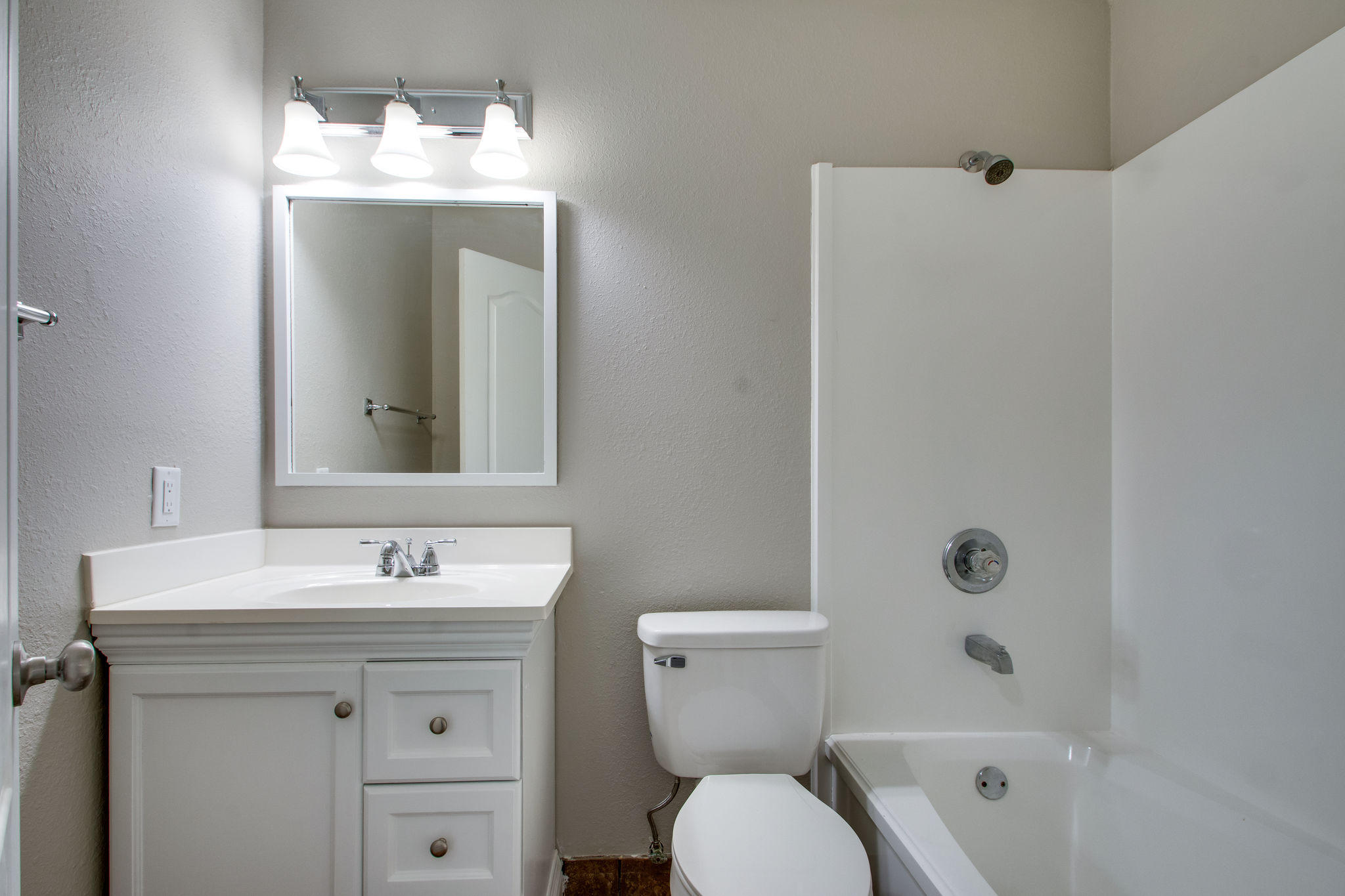 409 Main Street Destin, FL 32541 - Photo 17 of 19 a bathroom with a sink toilet vanity and shower