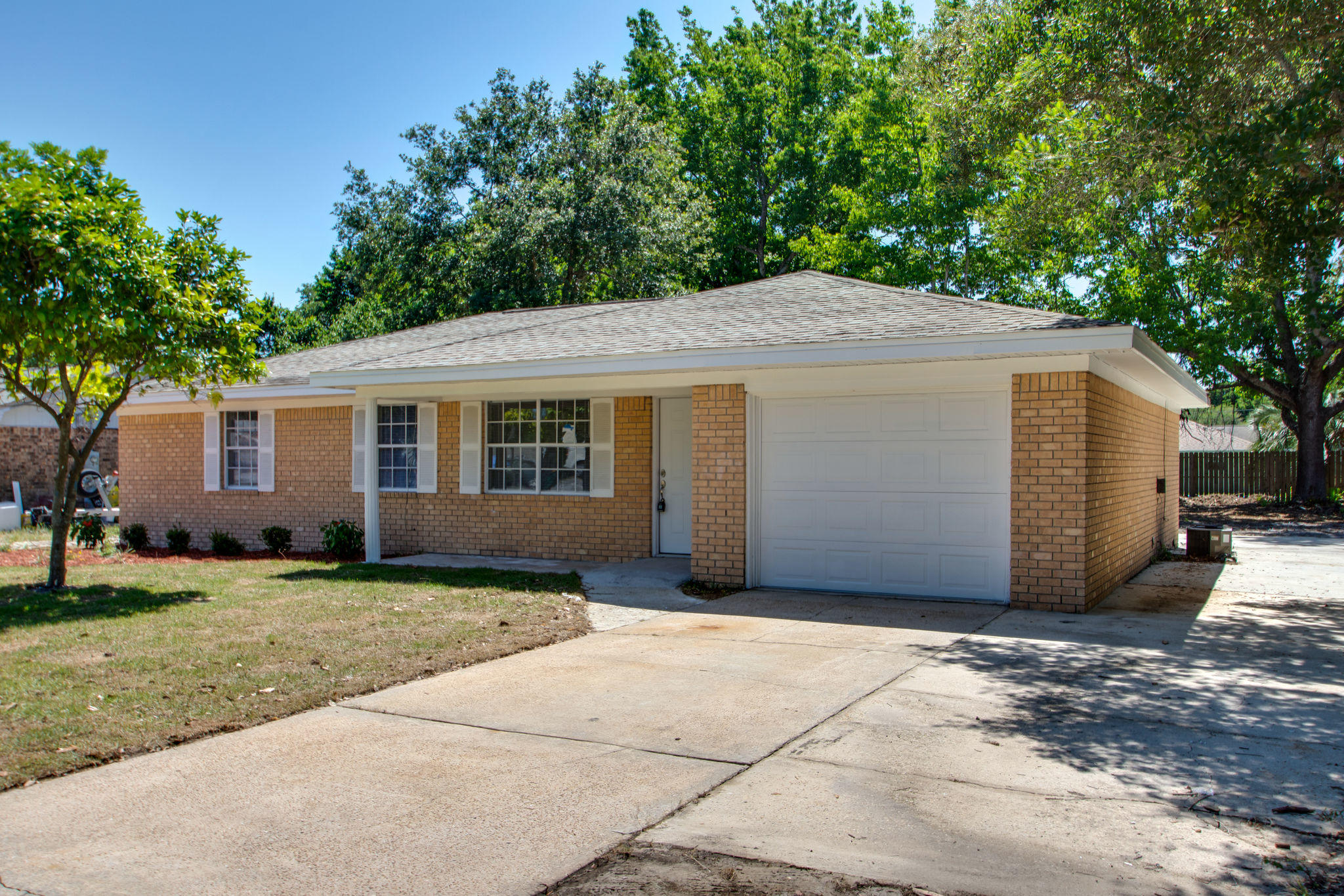 409 Main Street Destin, FL 32541 - Photo 2 of 19 a house view with a outdoor space