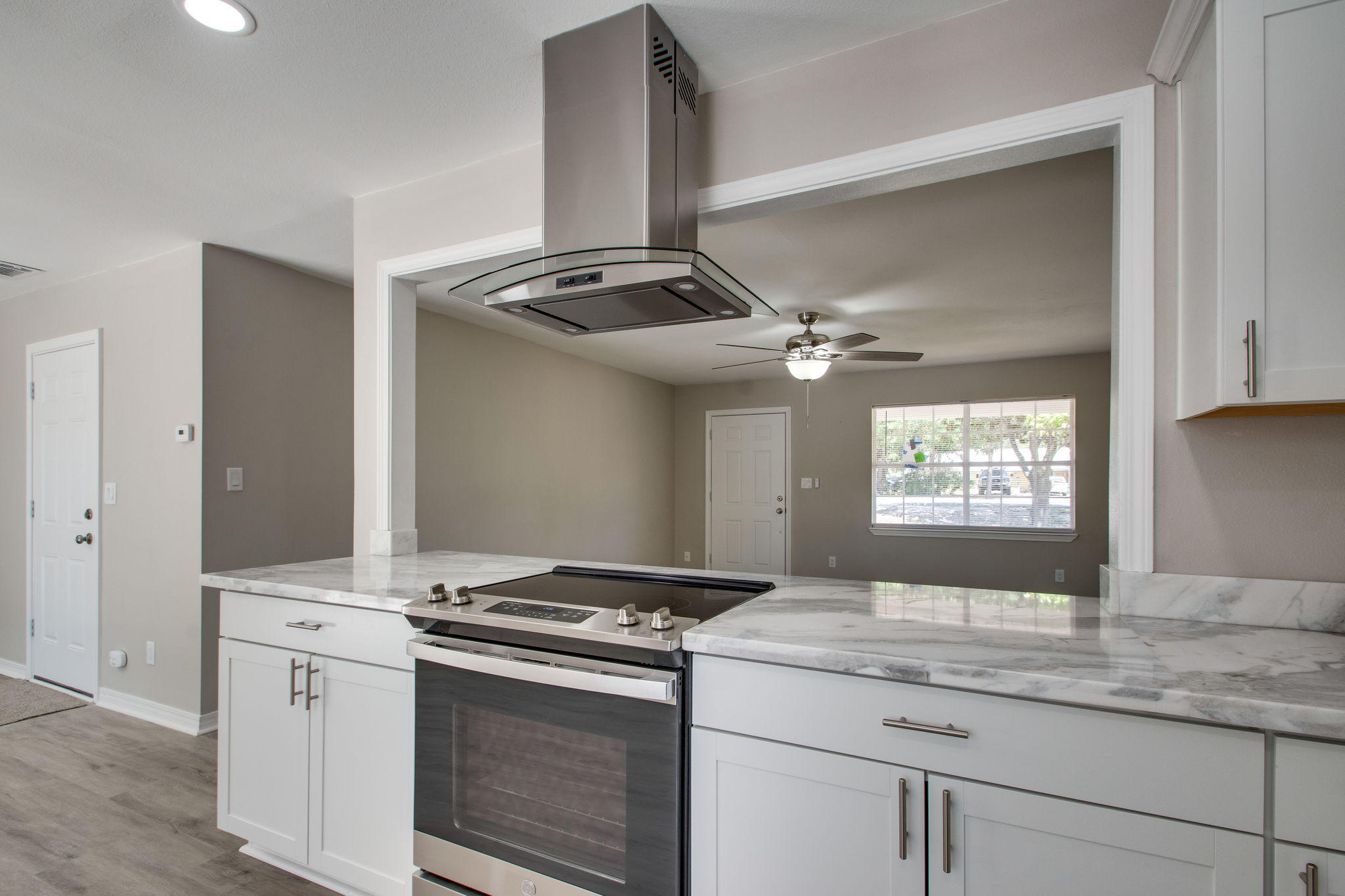 409 Main Street Destin, FL 32541 - Photo 9 of 19 a kitchen with a stove and a sink