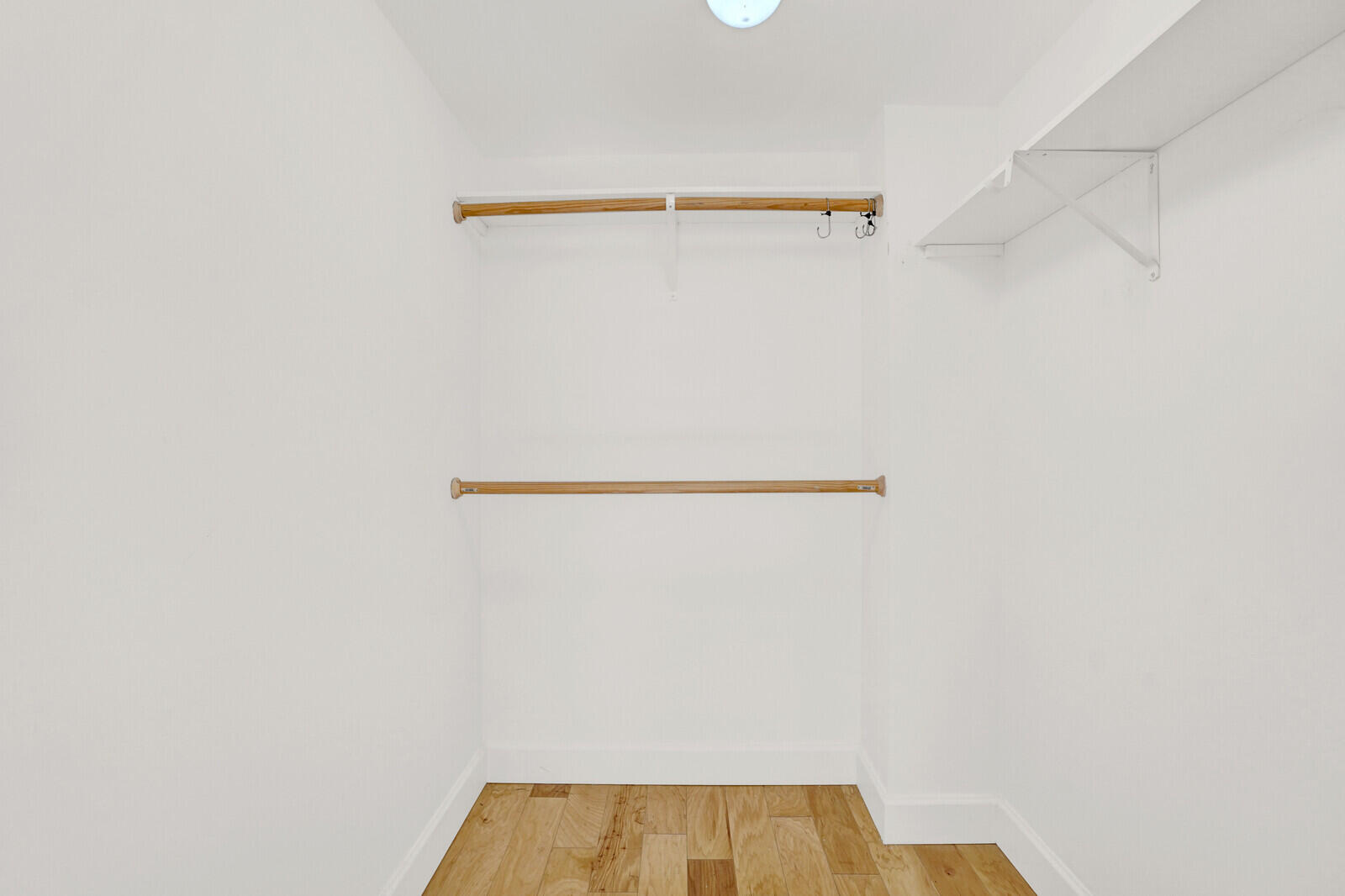 804 Cypress Boulevard, Unit 301 Pompano Beach, FL 33069 - Photo 20 of 34 a close up view of racks on the wall