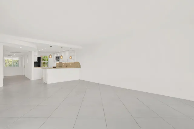 a view of a kitchen with a sink