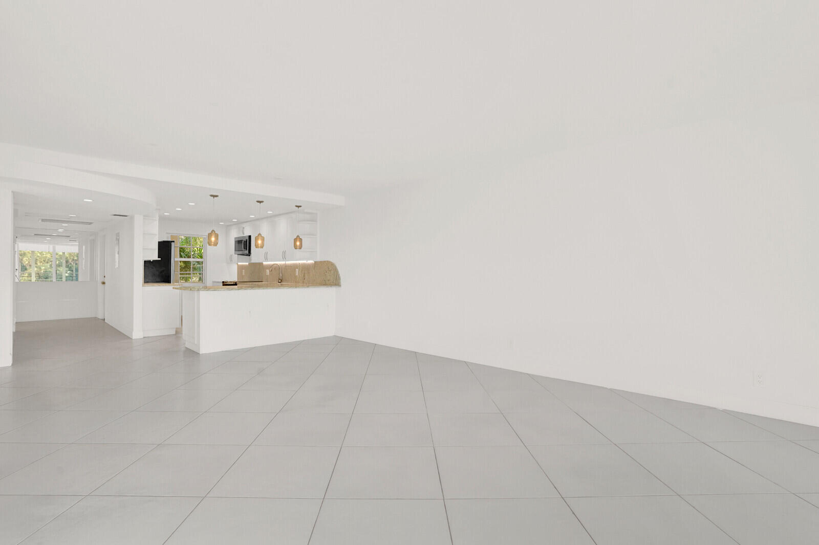 804 Cypress Boulevard, Unit 301 Pompano Beach, FL 33069 - Photo 4 of 34 a view of a kitchen with a sink