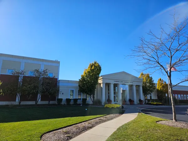 a view of a chairs with wooden floor