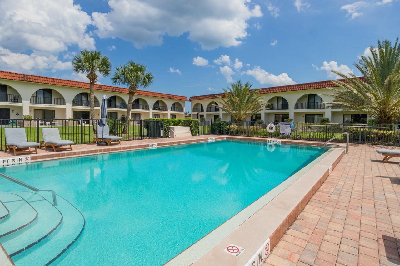 21 Dondanville Road, Unit 2 St. Augustine, FL 32080 - Photo 17 of 40 a view of a house with a backyard