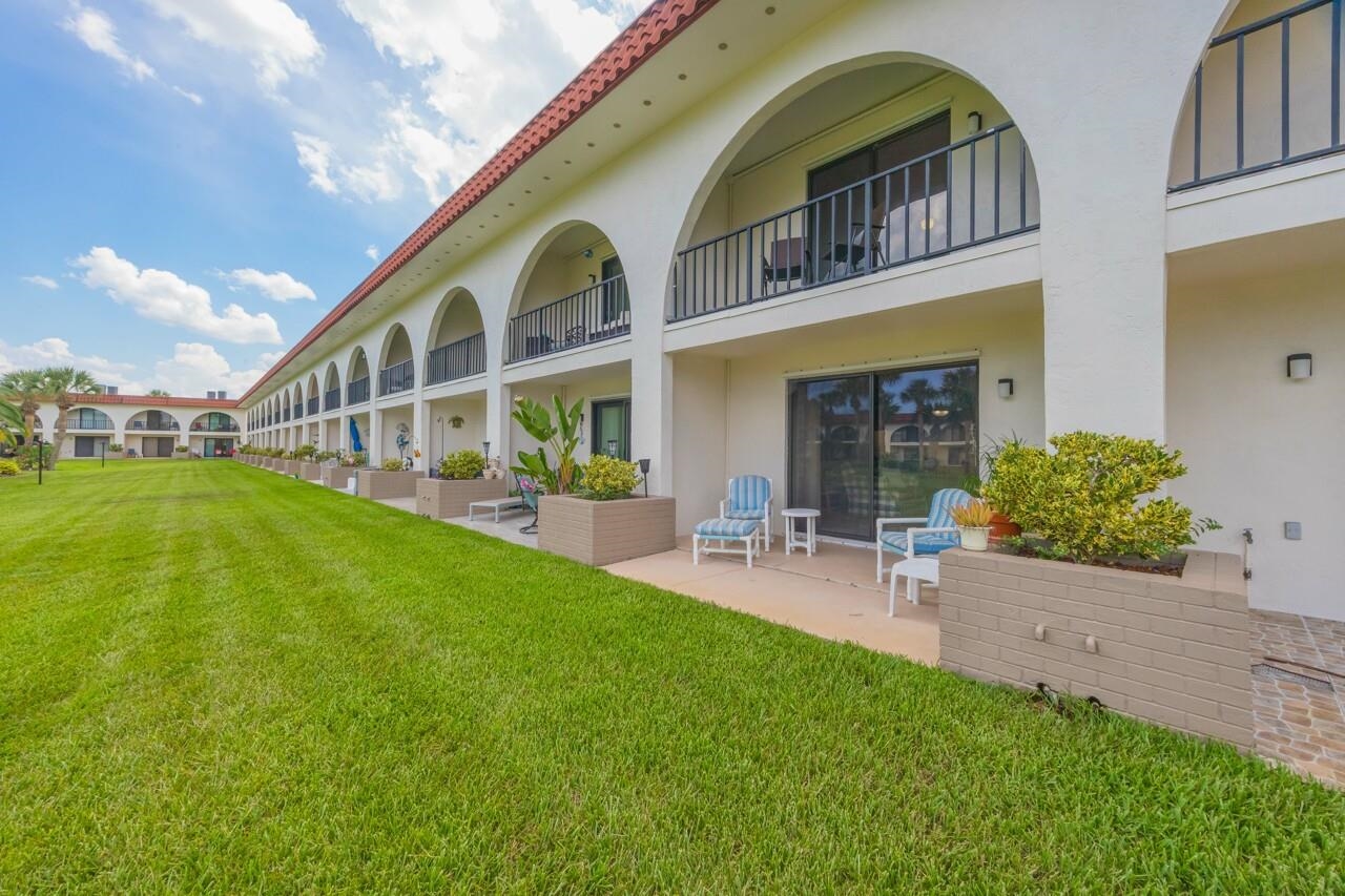 21 Dondanville Road, Unit 2 St. Augustine, FL 32080 - Photo 18 of 40 a view of an house with backyard porch and sitting area