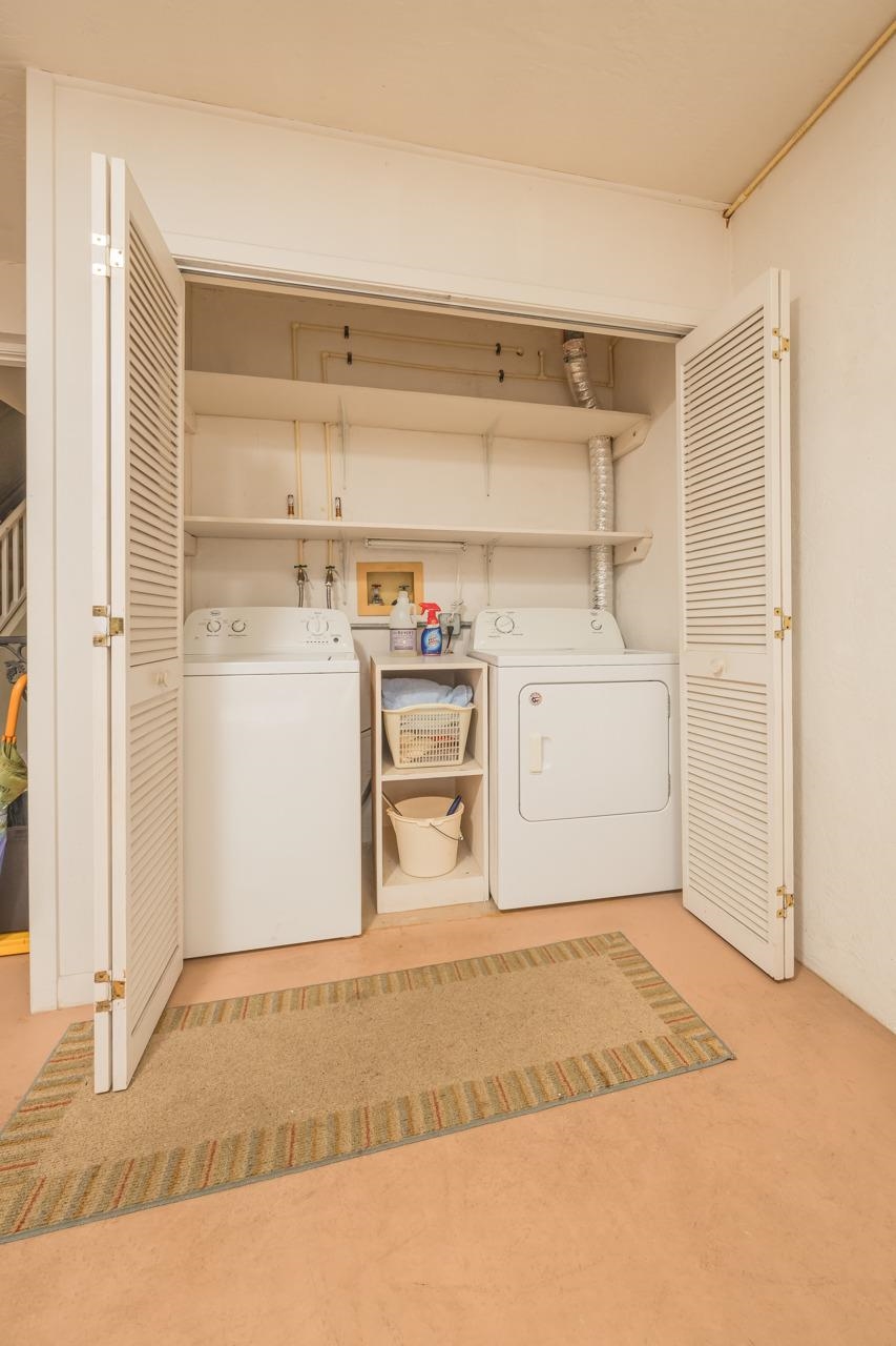 21 Dondanville Road, Unit 2 St. Augustine, FL 32080 - Photo 31 of 40 a view of a kitchen with storage and utility