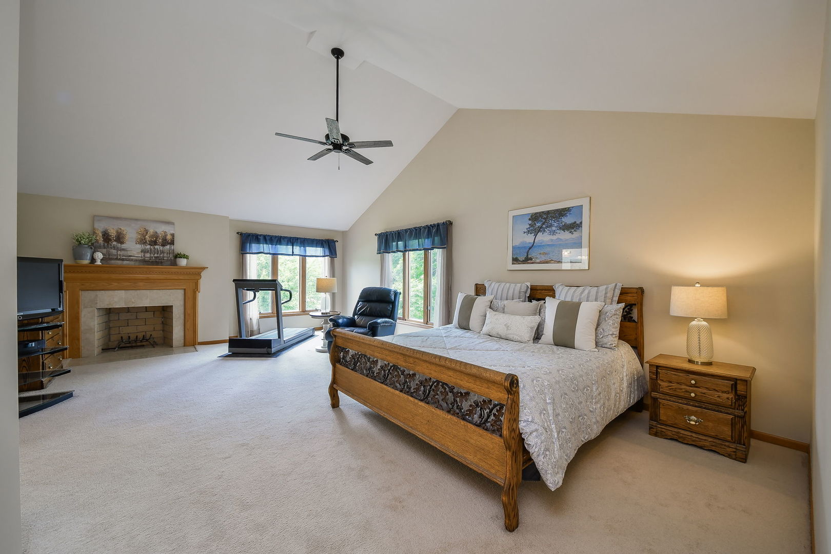 26W199 Klein Creek Drive Winfield, IL 60190 - Photo 15 of 29 a spacious bedroom with a bed and a fireplace