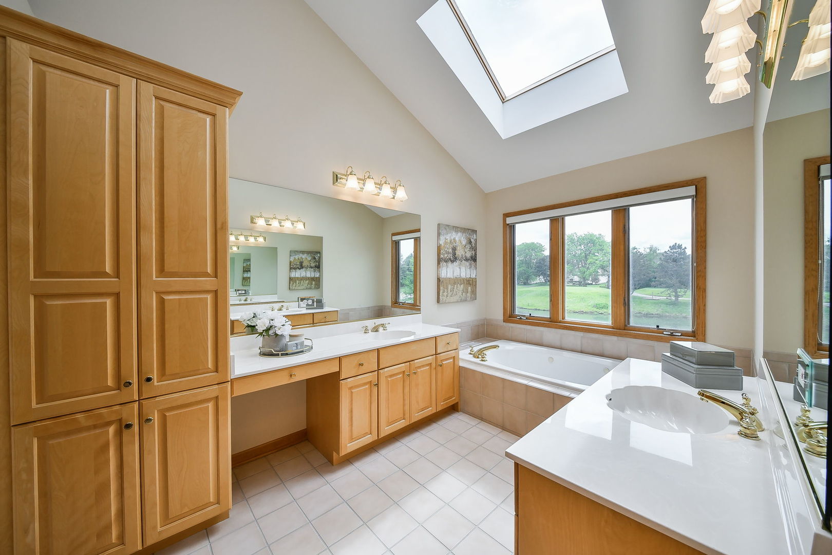 26W199 Klein Creek Drive Winfield, IL 60190 - Photo 17 of 29 a large white kitchen with a large window