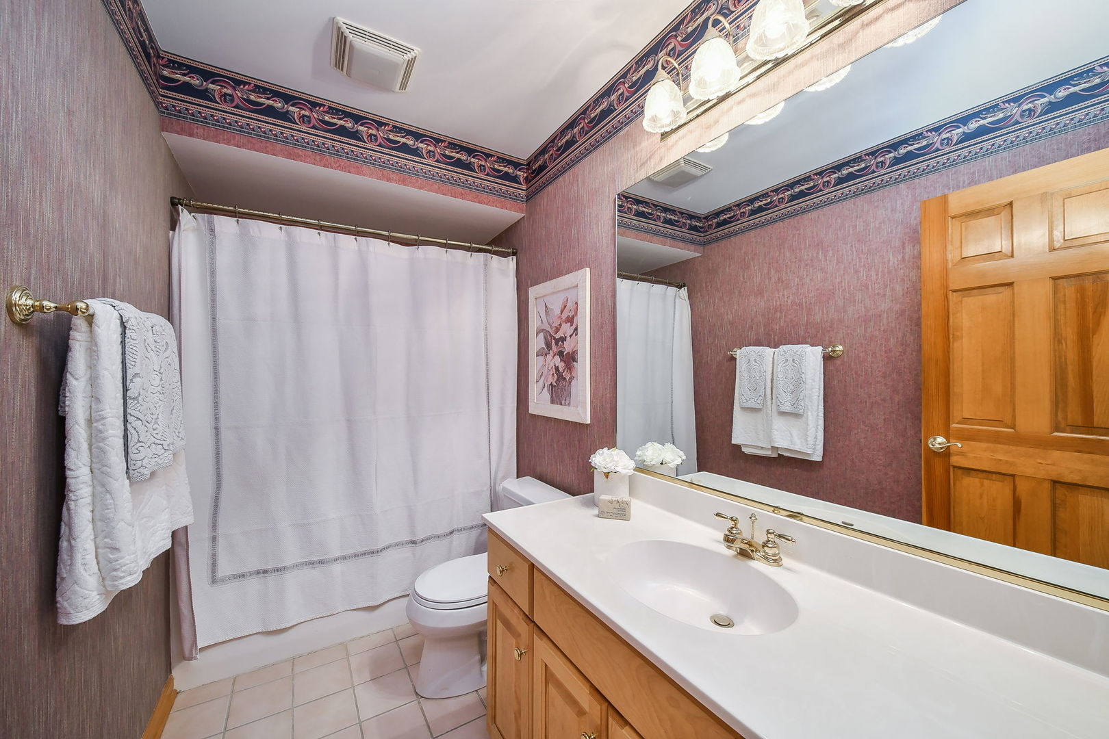 26W199 Klein Creek Drive Winfield, IL 60190 - Photo 20 of 29 a bathroom with a double vanity sink and mirror