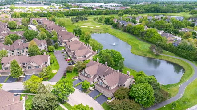 an aerial view of a house with a garden