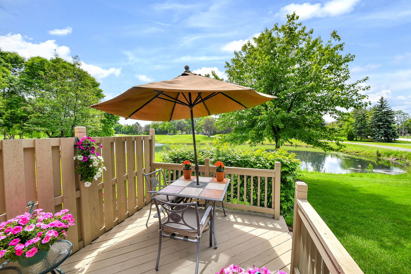 26W199 Klein Creek Drive Winfield, IL 60190 - Photo 6 of 29 a view of a deck with furniture and a garden
