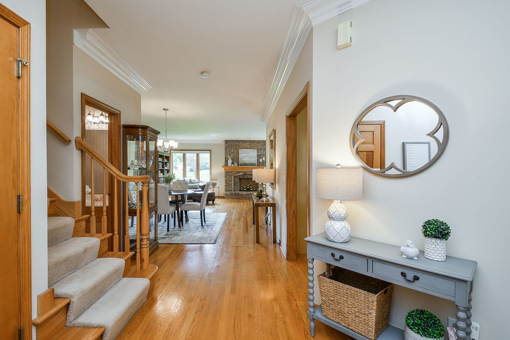 26W199 Klein Creek Drive Winfield, IL 60190 - Photo 7 of 29 a living room with furniture and a mirror