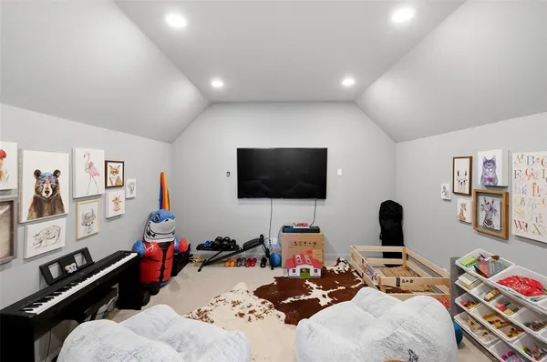 a bed room with bed and wall painting