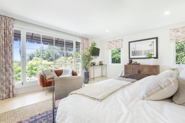780 Mission Canyon Road Santa Barbara, CA 93105 - Photo 39 of 97 a bedroom with bed and glass window