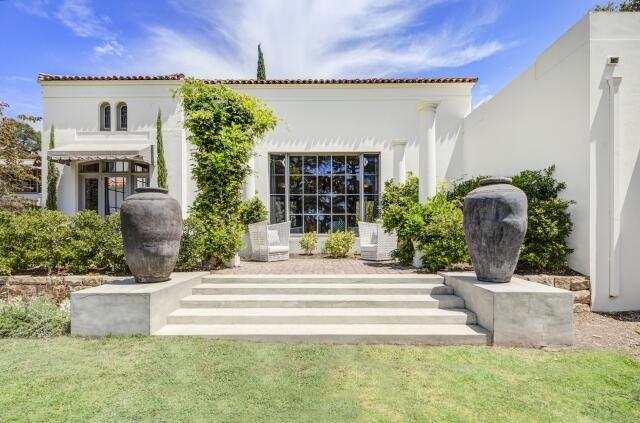 780 Mission Canyon Road Santa Barbara, CA 93105 - Photo 72 of 97 a view of a house with potted plants and a fountain