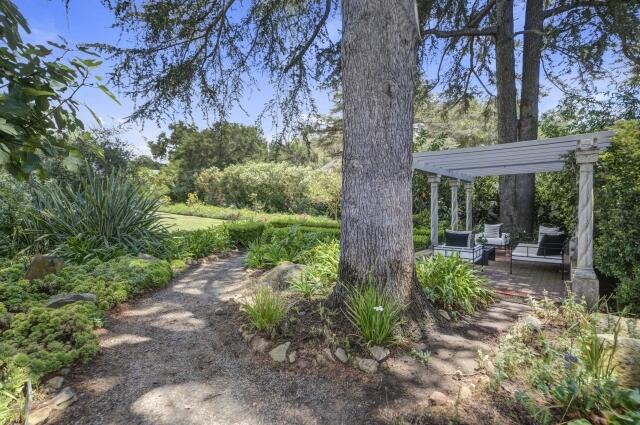 780 Mission Canyon Road Santa Barbara, CA 93105 - Photo 89 of 97 a view of a patio with chairs and a large tree