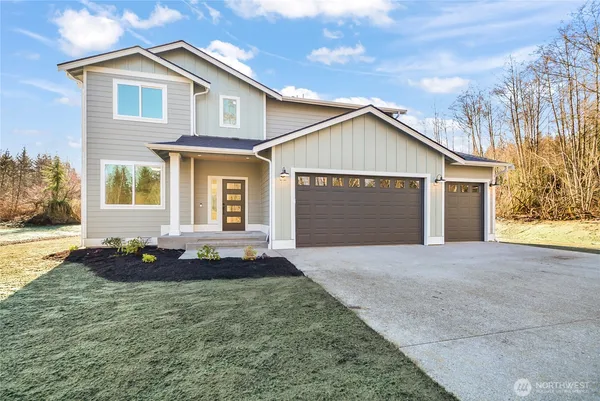a kitchen with kitchen island a counter top space appliances and cabinets