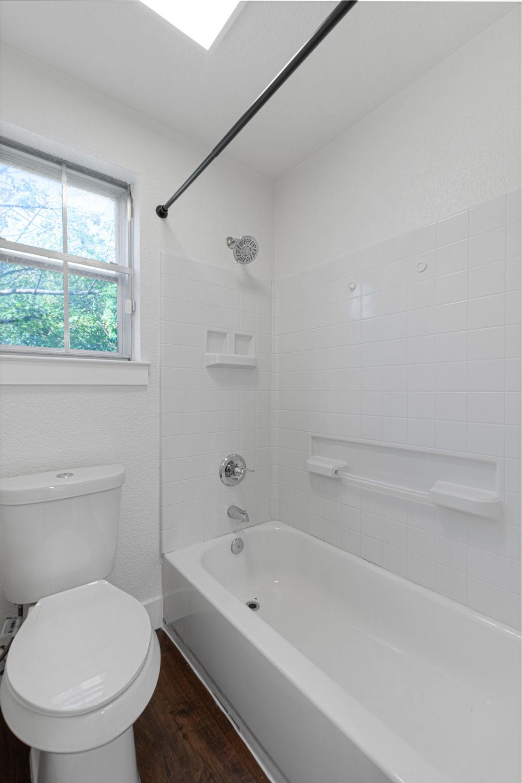 1307 Nix Road Lampasas, TX 76550 - Photo 12 of 30 a bathroom with a toilet and a bathtub