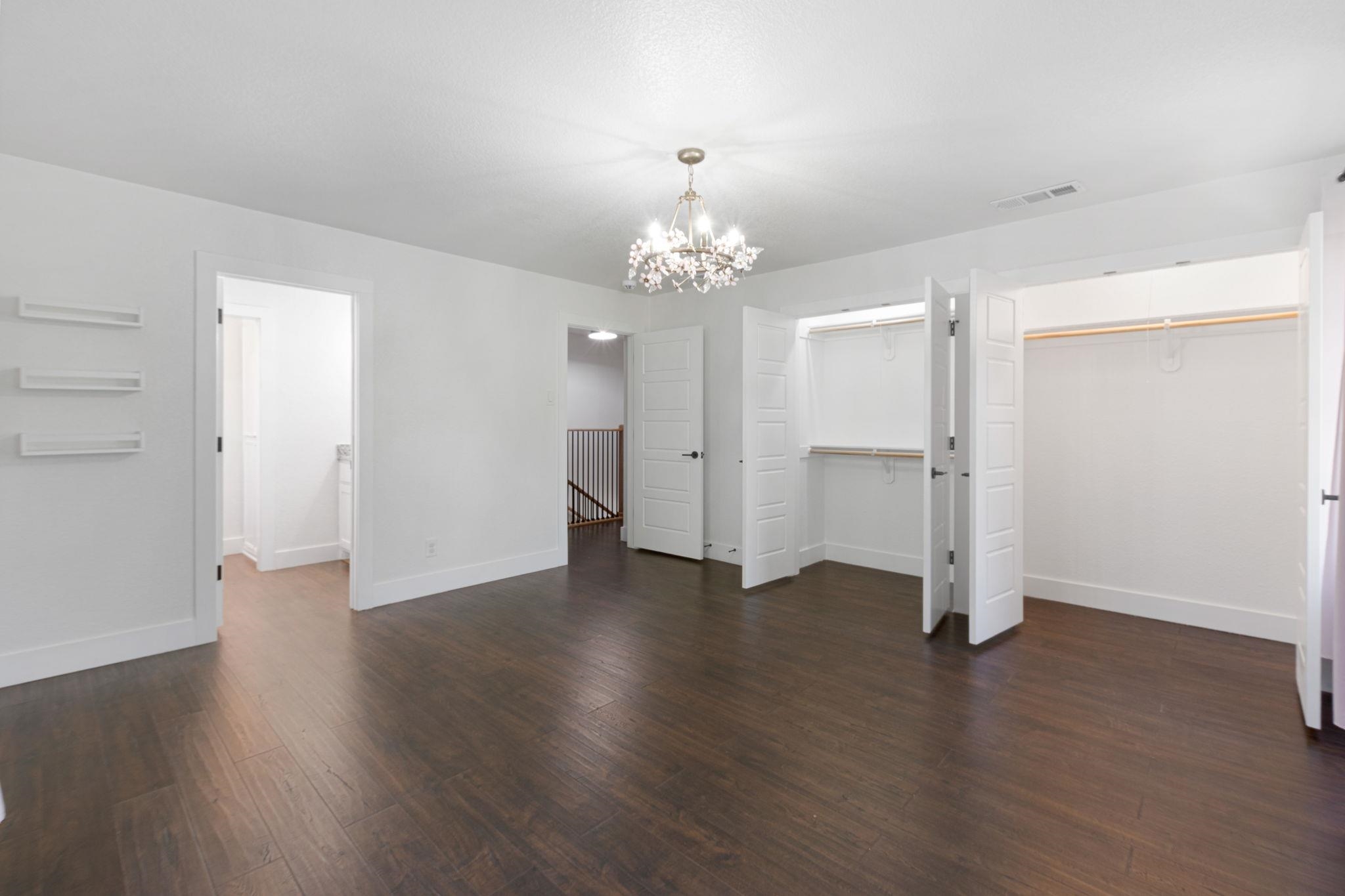 1307 Nix Road Lampasas, TX 76550 - Photo 17 of 30 an empty room with wooden floor closet and windows