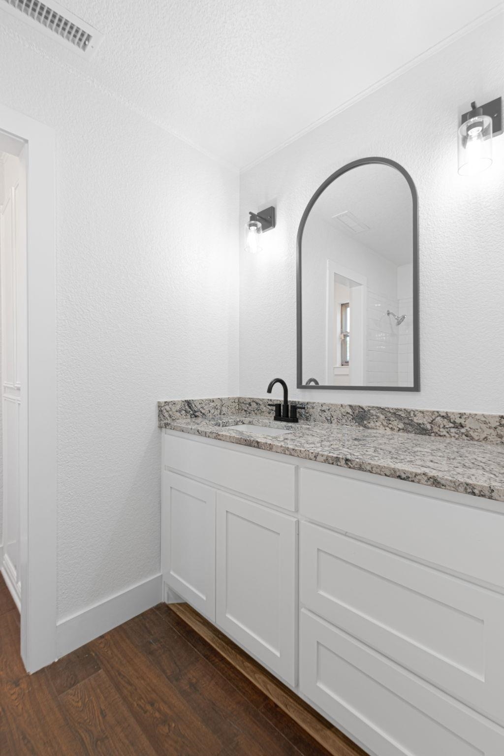 1307 Nix Road Lampasas, TX 76550 - Photo 18 of 30 a room with a sink and a mirror
