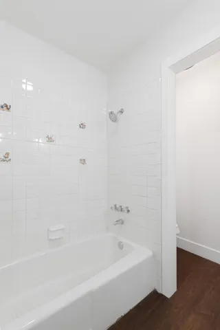 a bathroom with a bathtub