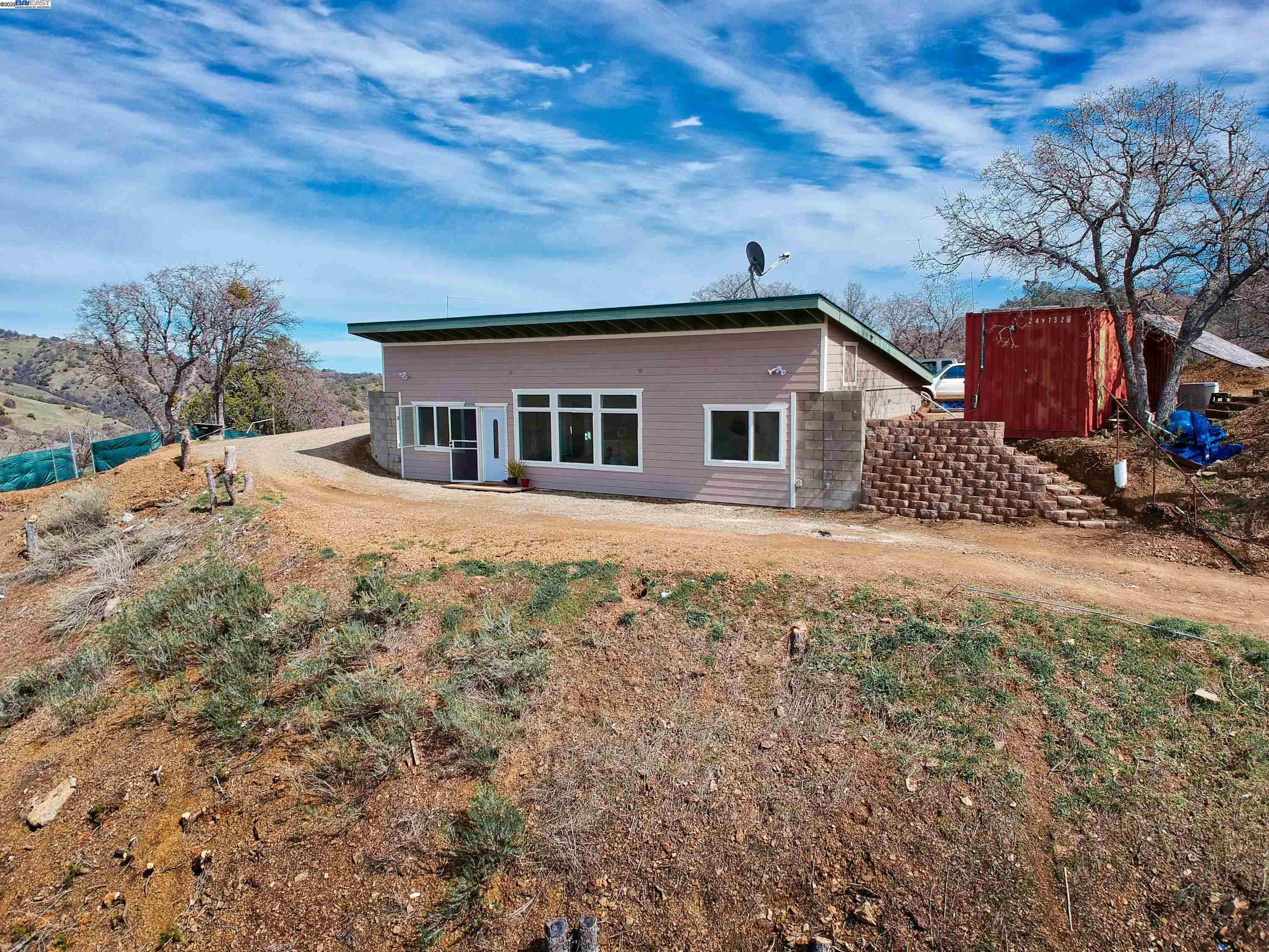 19990 Mines Road Livermore, CA 94550 - Photo 1 of 18 a front view of a house with a yard